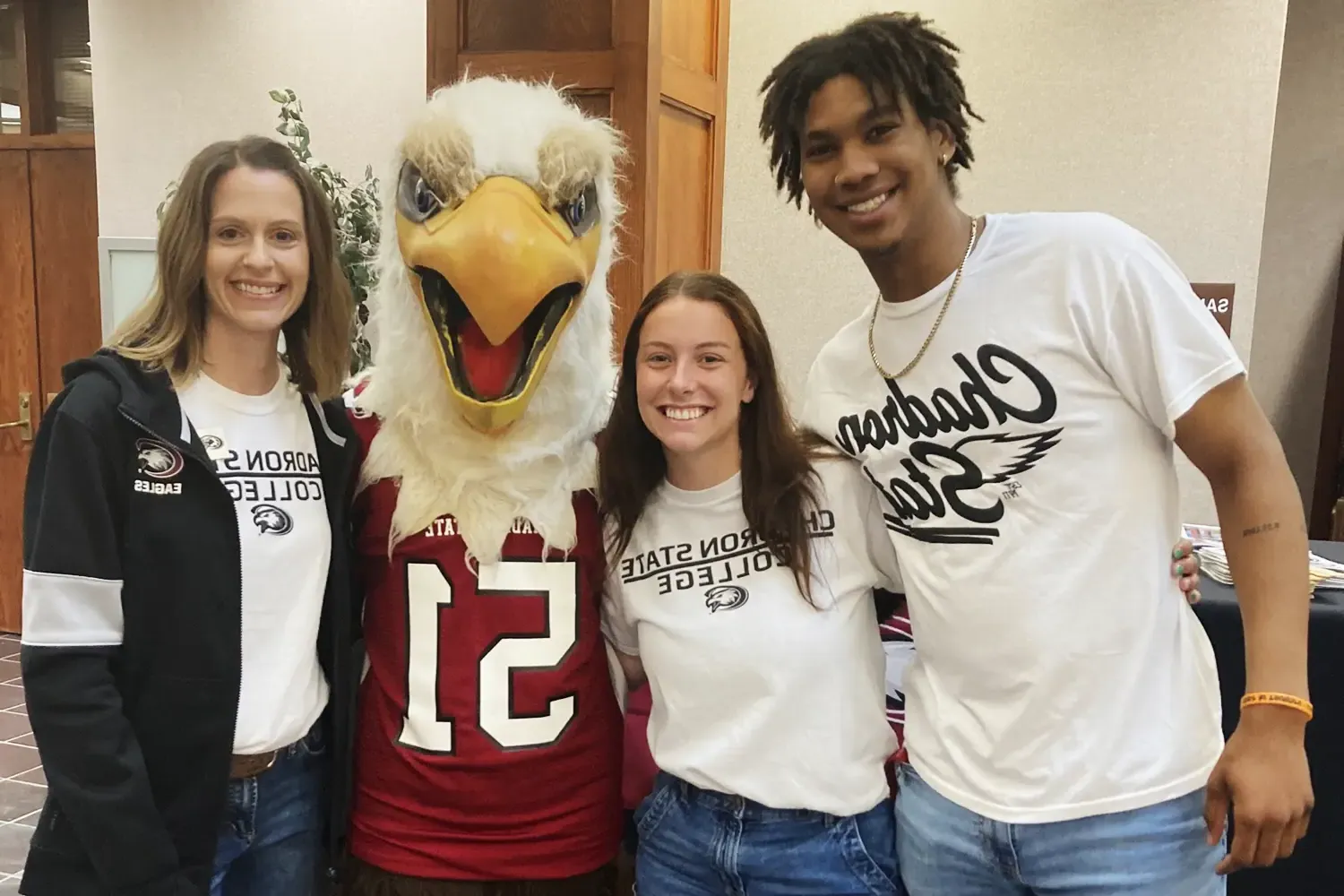 Admissions employees pose during an Orientation event